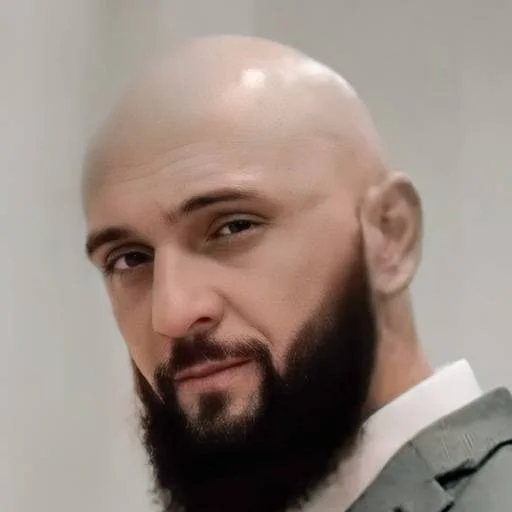 Теоман Хос фото